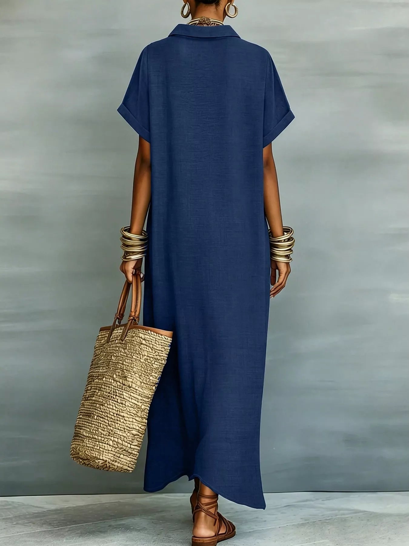 Beige maxi shirt dress with collared neckline, button-down front, short sleeves, and relaxed fit