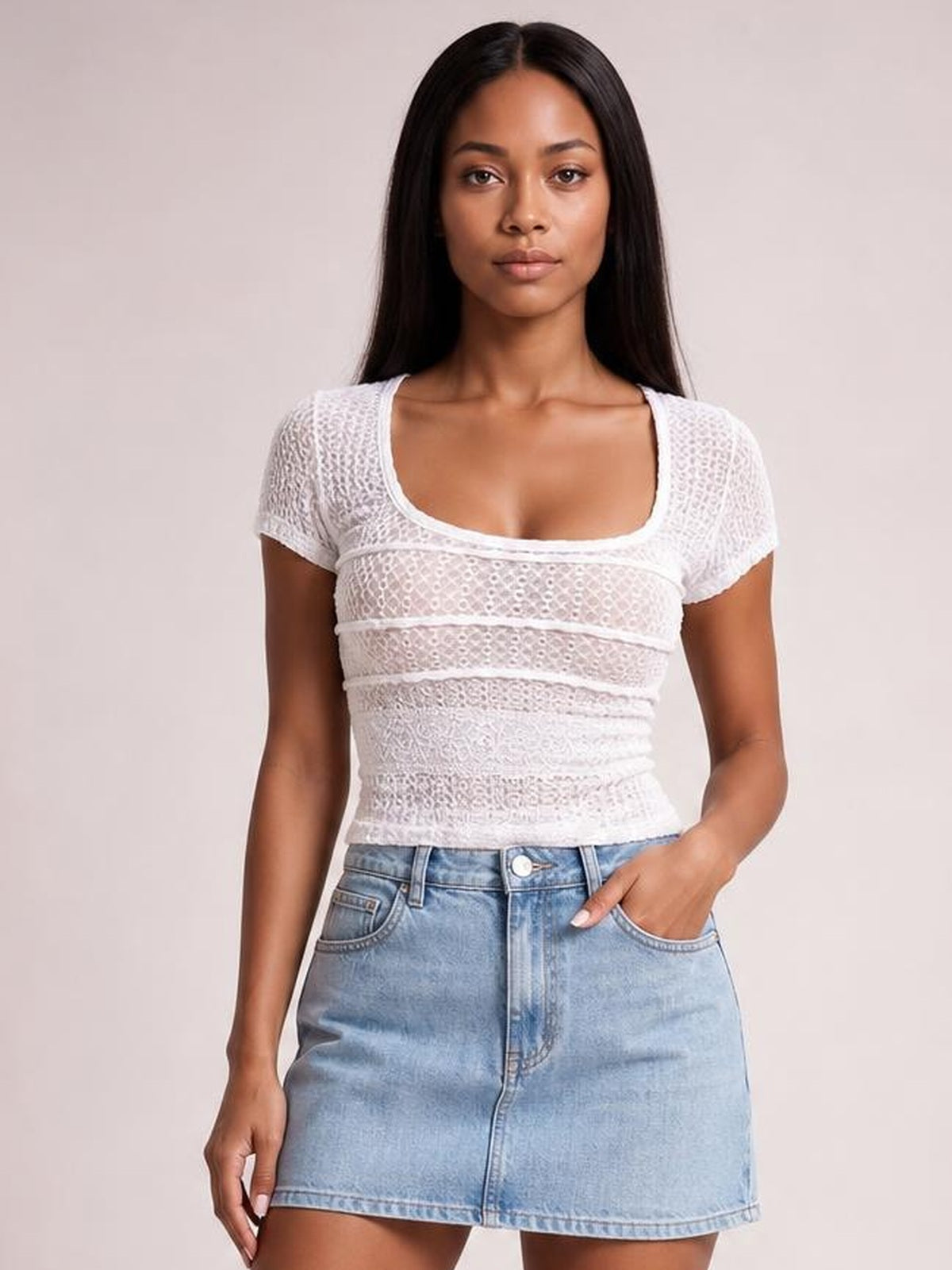 Model wears a white lace-detail square-neck short-sleeve T-shirt with a fitted, ruched silhouette and horizontal panel construction.