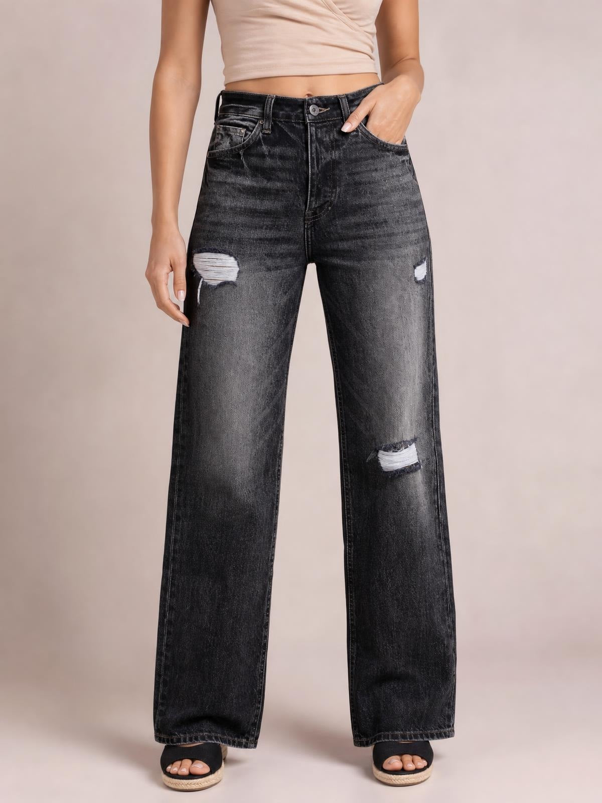 Model stands front-facing with one hand in the pocket, wearing dark gray distressed straight-leg jeans with a high waist, belt loops, five-pocket construction, and ripped knees.