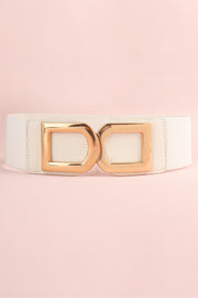 A white PU belt with a smooth, stitched body and polished gold-tone alloy double D buckle in a structured statement design.