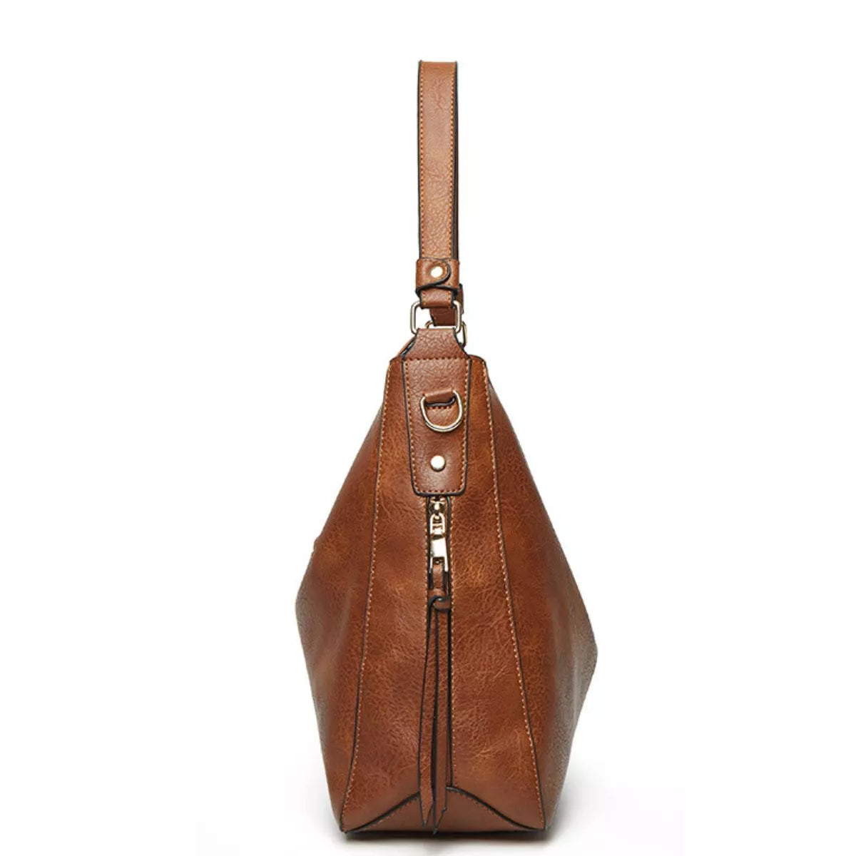 Medium brown PU leather crossbody bag with a tapered structured silhouette, long adjustable strap, stitched panels, top D-ring, and front vertical zipper.