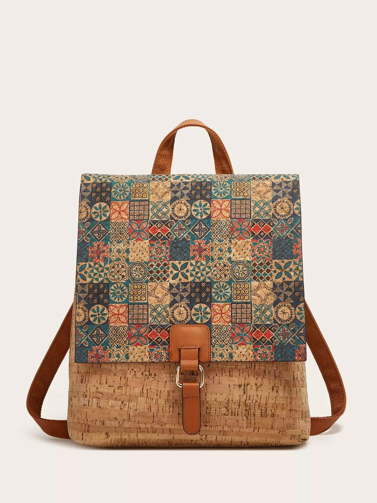 Medium vintage flap backpack in patterned teal, tan, red, and navy PU leather with a cork-look lower panel, adjustable shoulder straps, top handle, and buckle closure.