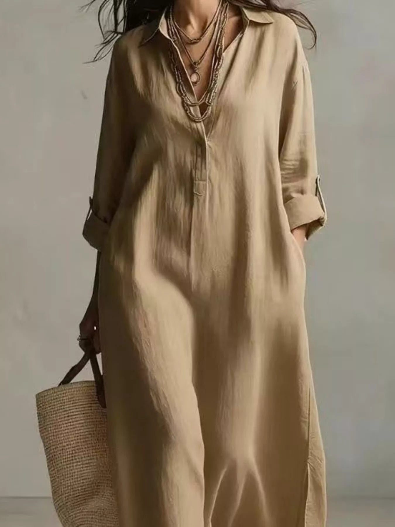 Relaxed plus-size cream midi shirt dress with collar, pockets, button front, and short sleeves