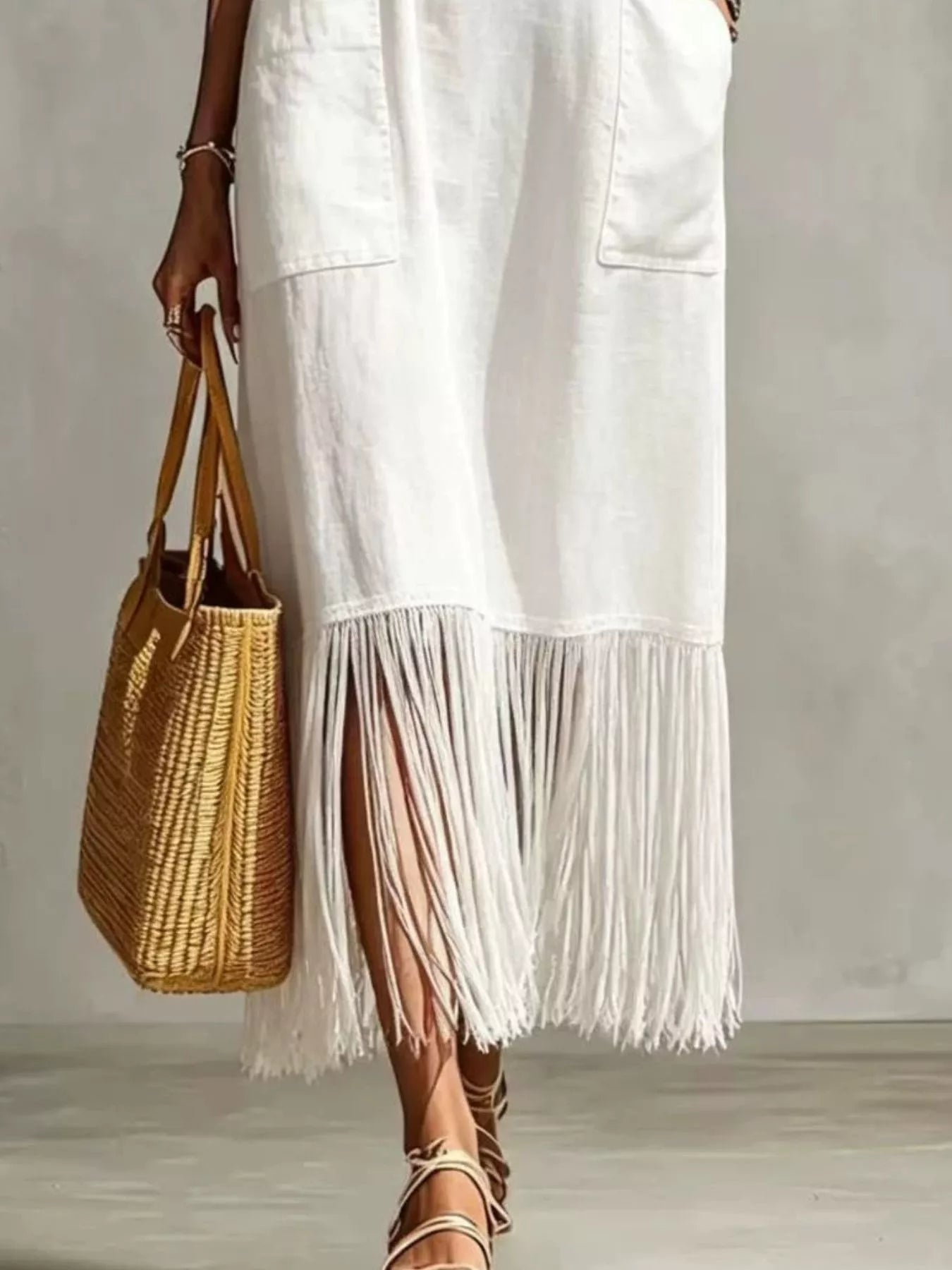 Plus-size V-neck spaghetti strap midi dress with fringe hem and pockets