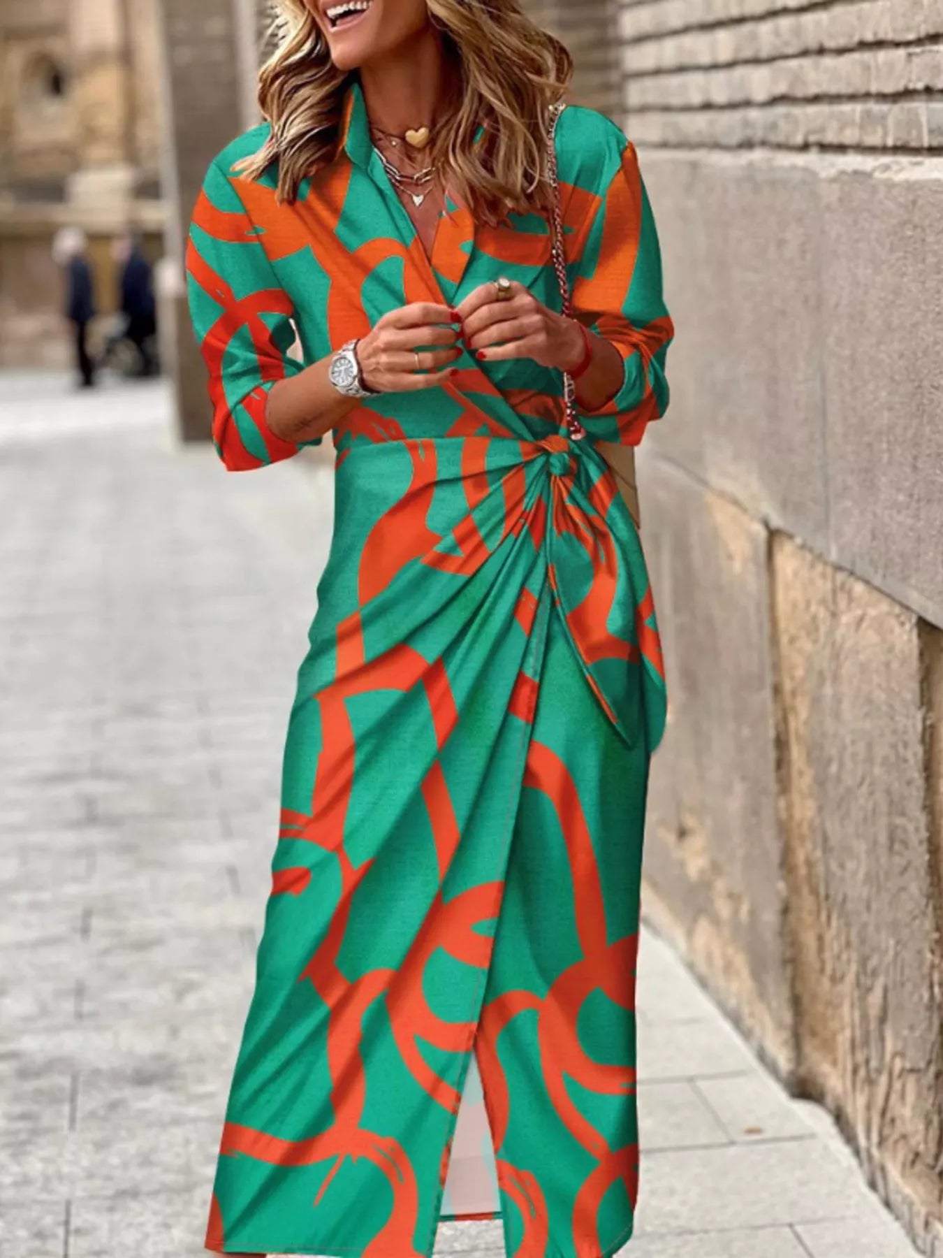 Green and red abstract-print collared midi shirt dress with three-quarter sleeves and a tied waist