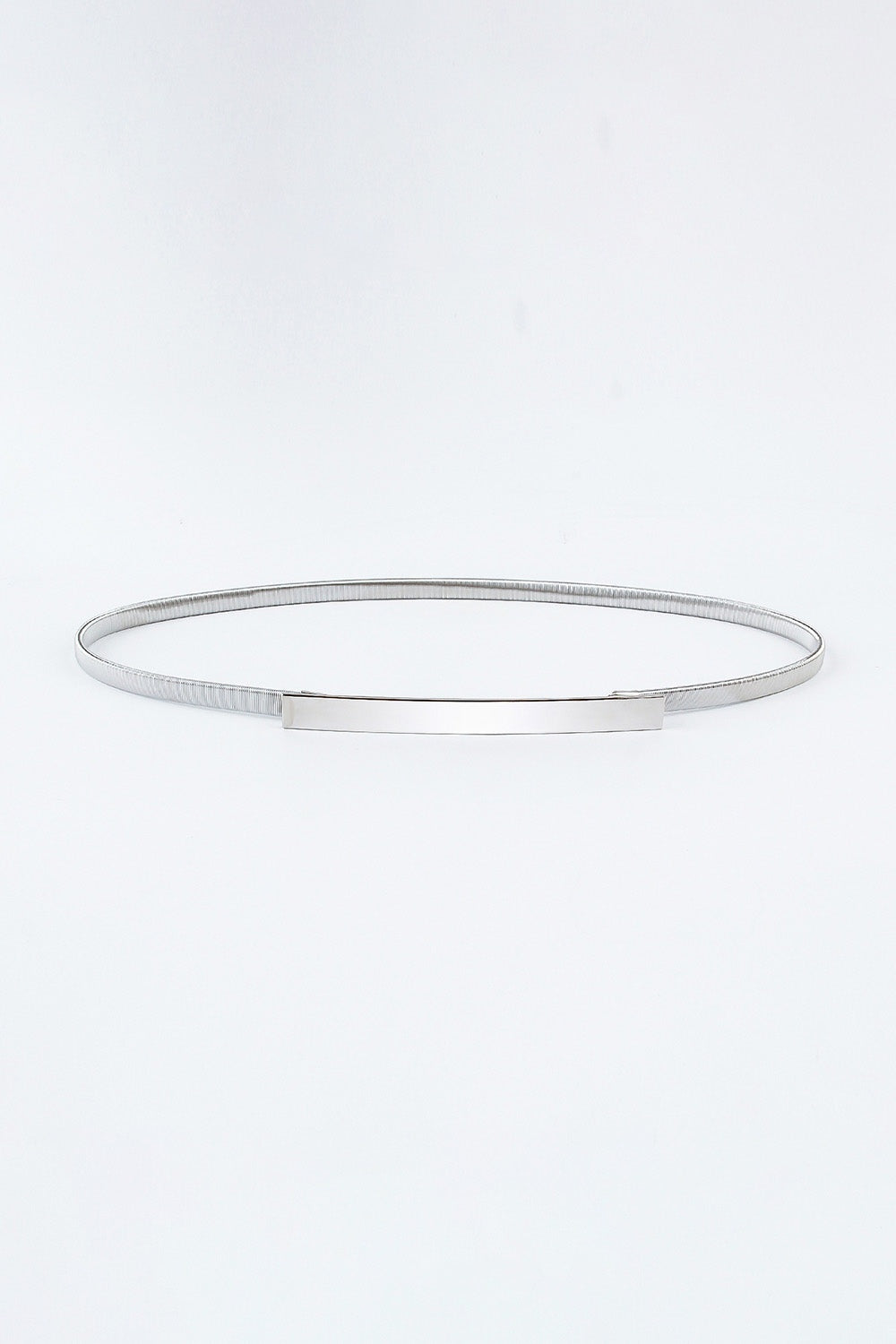 Silver-toned elastic iron skinny belt shown laid flat, featuring a slender textured band and sleek structured rectangular buckle.