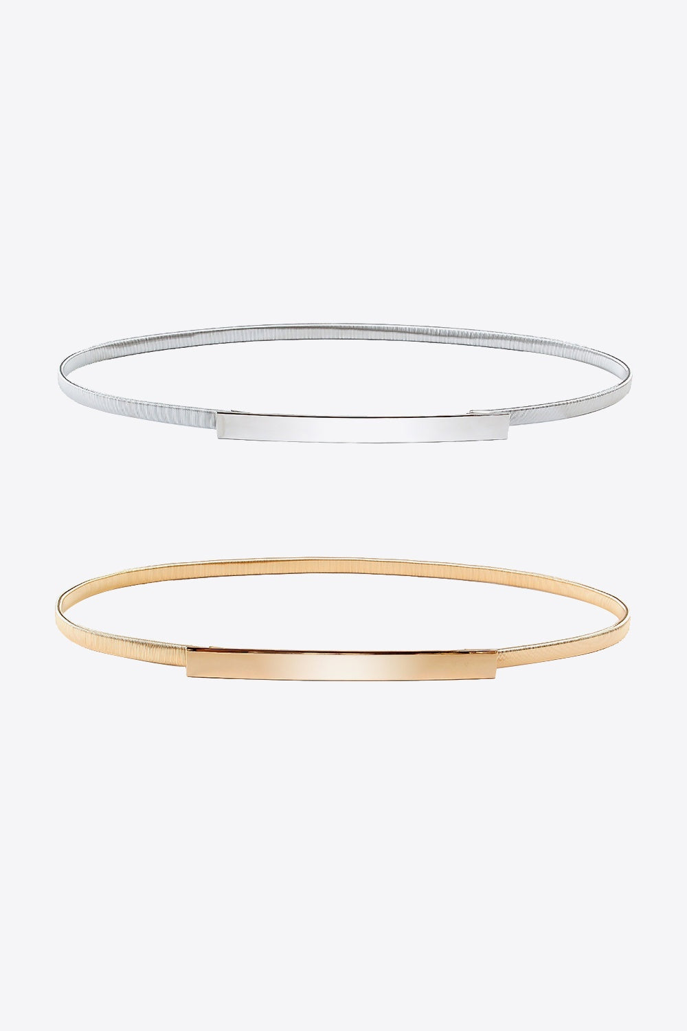 Two elastic iron skinny belts in silver and gold feature slender profiles and sleek rectangular buckles for polished waist definition.
