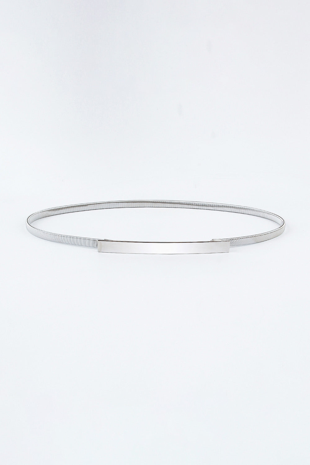 Silver-toned elastic iron skinny belt shown laid flat, featuring a slender textured band and sleek structured rectangular buckle.