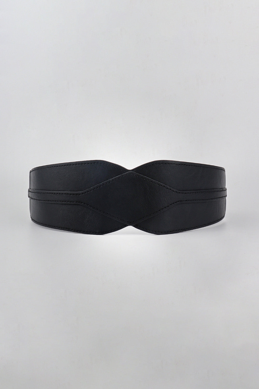 Black wide PU elastic belt with a sculptural contoured front, curved silhouette, and neat stitched edges for a polished waist-defining finish.