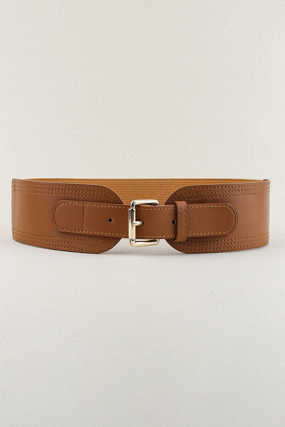 Wide brown PU elastic belt with a structured silver-tone buckle, smooth belt tab, and refined stitched detailing for a polished waist-defining silhouette.