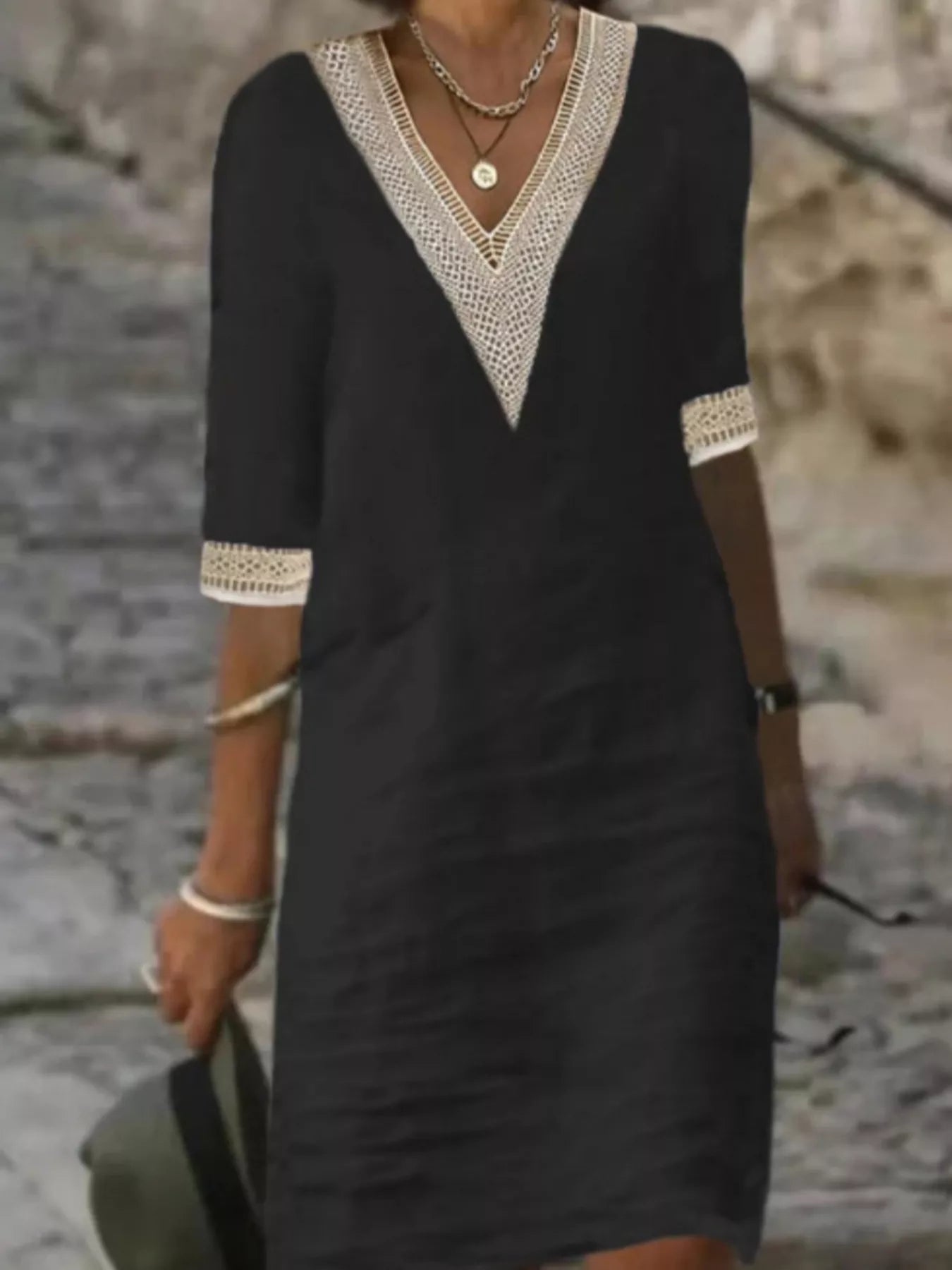Plus-size white V-neck dress with lace trim and half sleeves