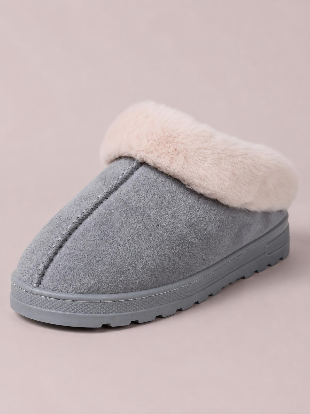 Gray faux fur round-toe platform slipper with a soft plush collar, suede-like upper, stitched center seam, and thick textured rubber tread sole.