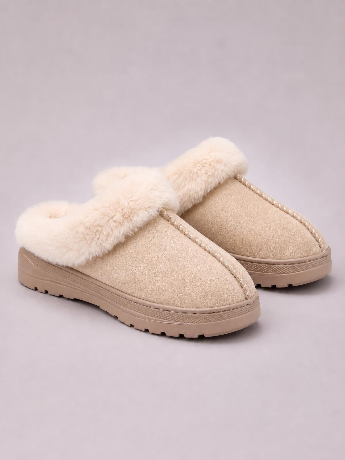 Beige faux fur round-toe platform slippers feature plush fur collars, suede-like uppers, stitched trim, and thick textured rubber soles.