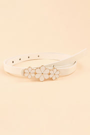 Slim ivory PU belt with a polished floral buckle featuring three outlined flowers and a row of adjustable holes.