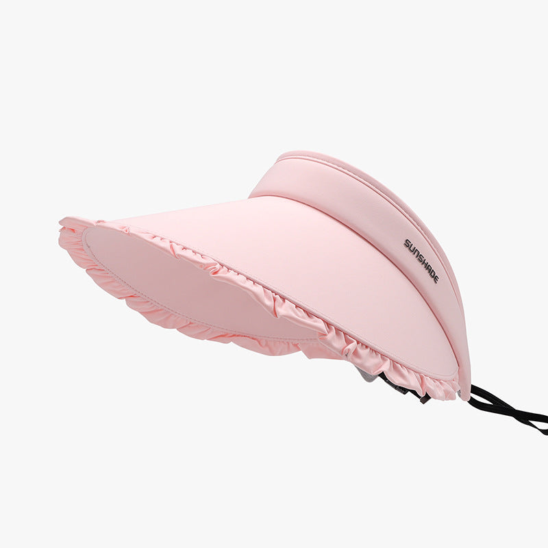 Pink adjustable ice silk sun hat with a softly rounded visor silhouette, wide brim, gathered frill edging, smooth construction, and visible chin strap.