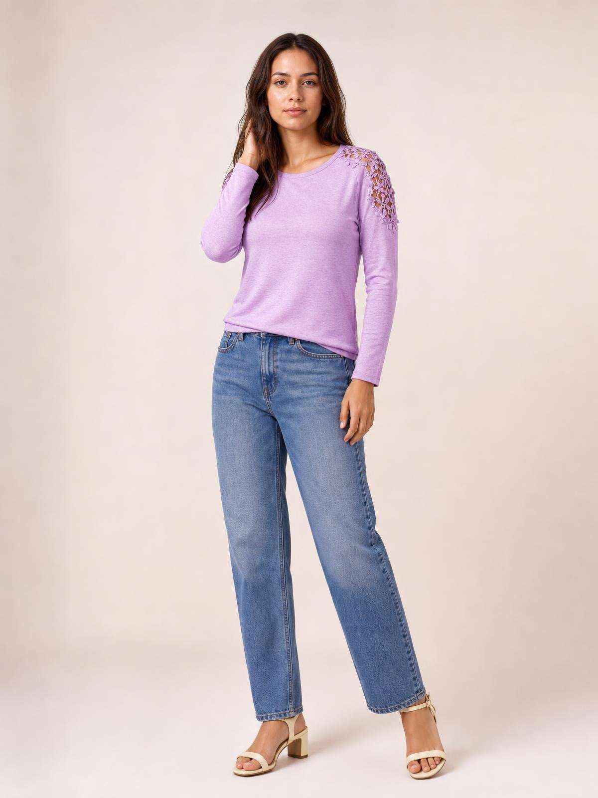 A model poses in a lavender cutout round-neck long-sleeve T-shirt with lace-detail shoulder panels and a comfortable, straight silhouette.