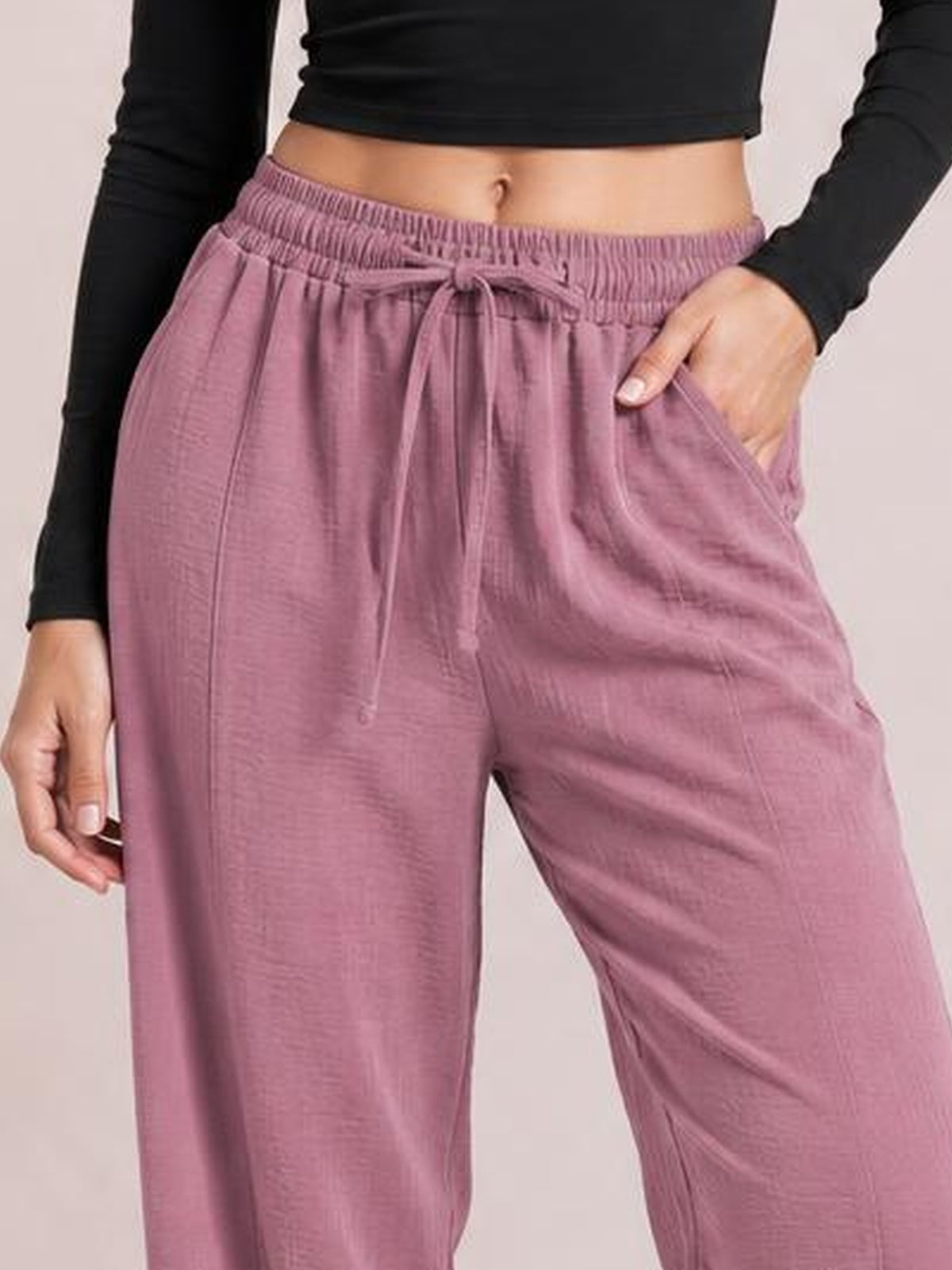 Drawtising Cropped Jogger Pants · Studio Prop Pose