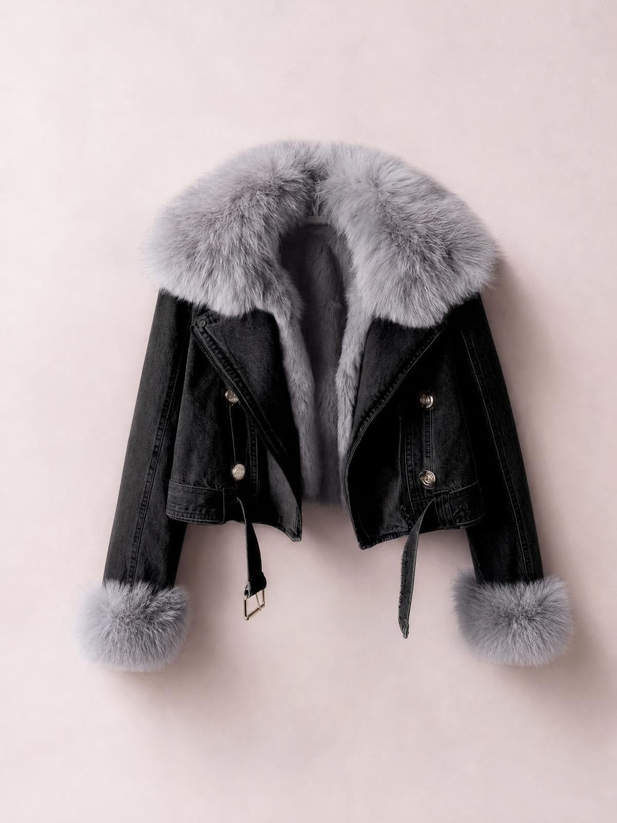 A black denim jacket with a plush gray faux fur collar and cuffs, cropped silhouette, zip front, button details, lapels, and an adjustable waist belt.