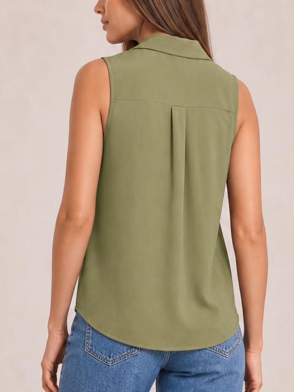 Model shown from behind wears an olive-green Johnny collar button-up tank with sleeveless cut, relaxed silhouette, back yoke pleat, and curved hem.