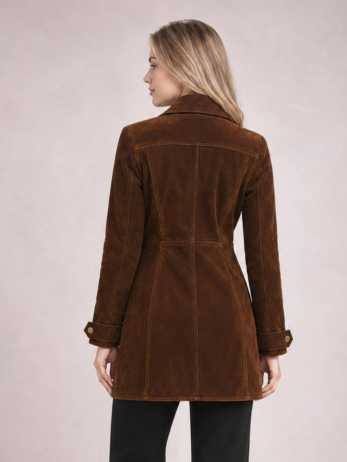 Model shown from the back wearing a brown long-sleeve jacket with a collared neckline, paneled construction, fitted waist, and hip-length silhouette.