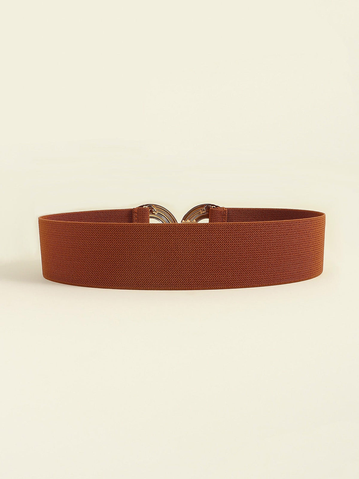 Brown elastic wide belt with a textured 2-inch band and partially visible geometric alloy buckle featuring interlocking rounded forms.