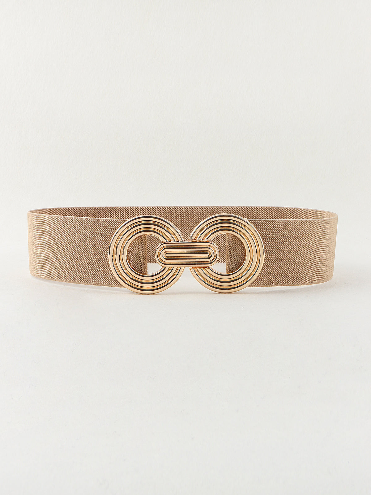 A tan elastic wide belt features a broad woven band and a dimensional gold-tone geometric alloy buckle with interlocking rounded forms.