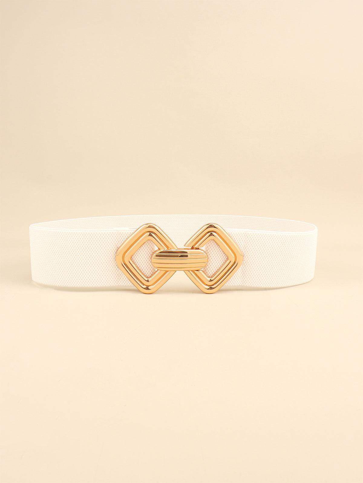 White elastic wide belt with a polished gold-tone alloy buckle featuring interlocking geometric shapes and a structured statement silhouette.