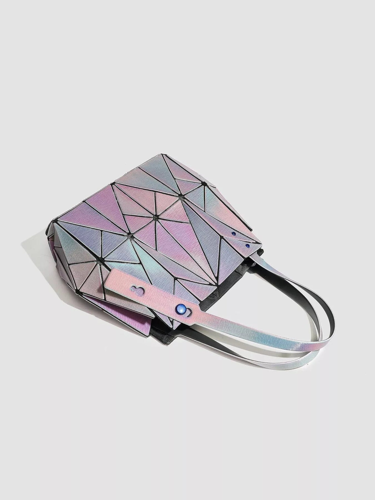 Medium geometric iridescent PVC shoulder bag in pink, lavender, and blue, featuring angular panel construction, black edging, and twin shoulder straps.