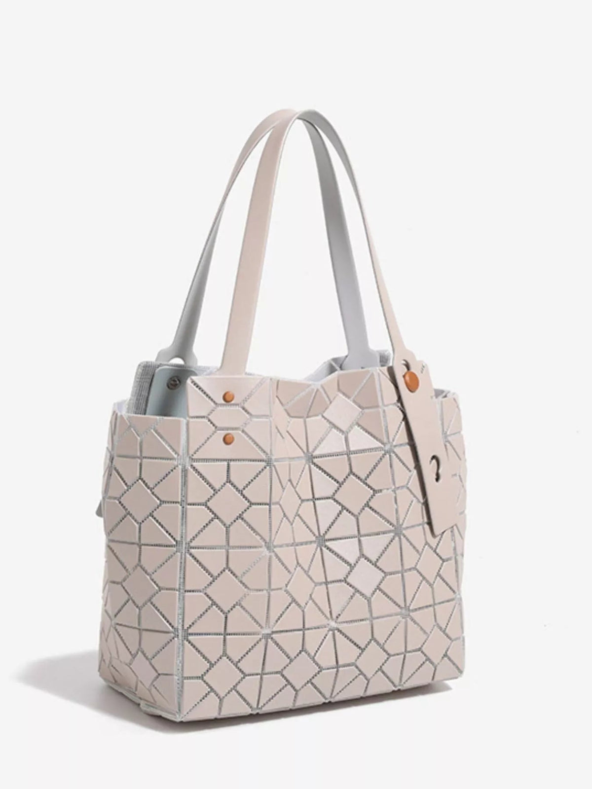 Medium structured PVC handbag in pale beige features a geometric lattice pattern, spacious rectangular silhouette, and long double top handles.