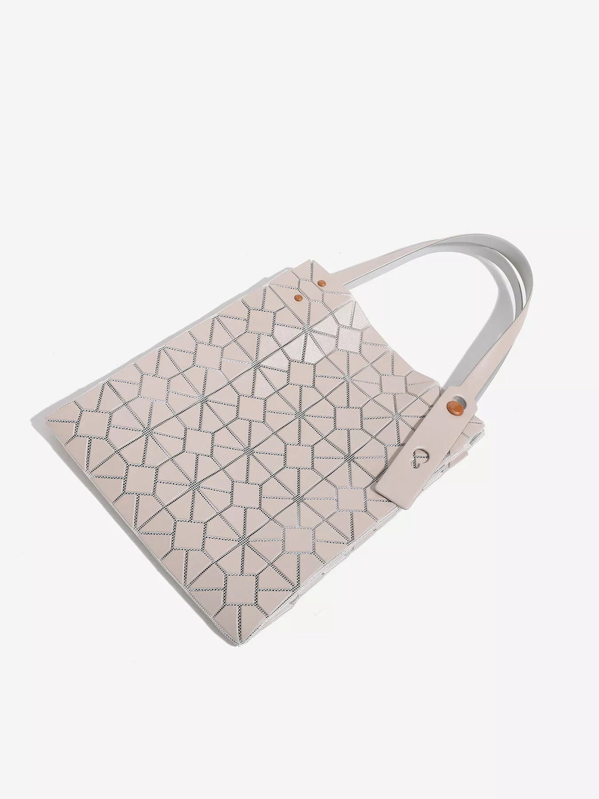 Medium blush PVC handbag with a structured silhouette, geometric lattice pattern, twin top handles, and secure strap accents.