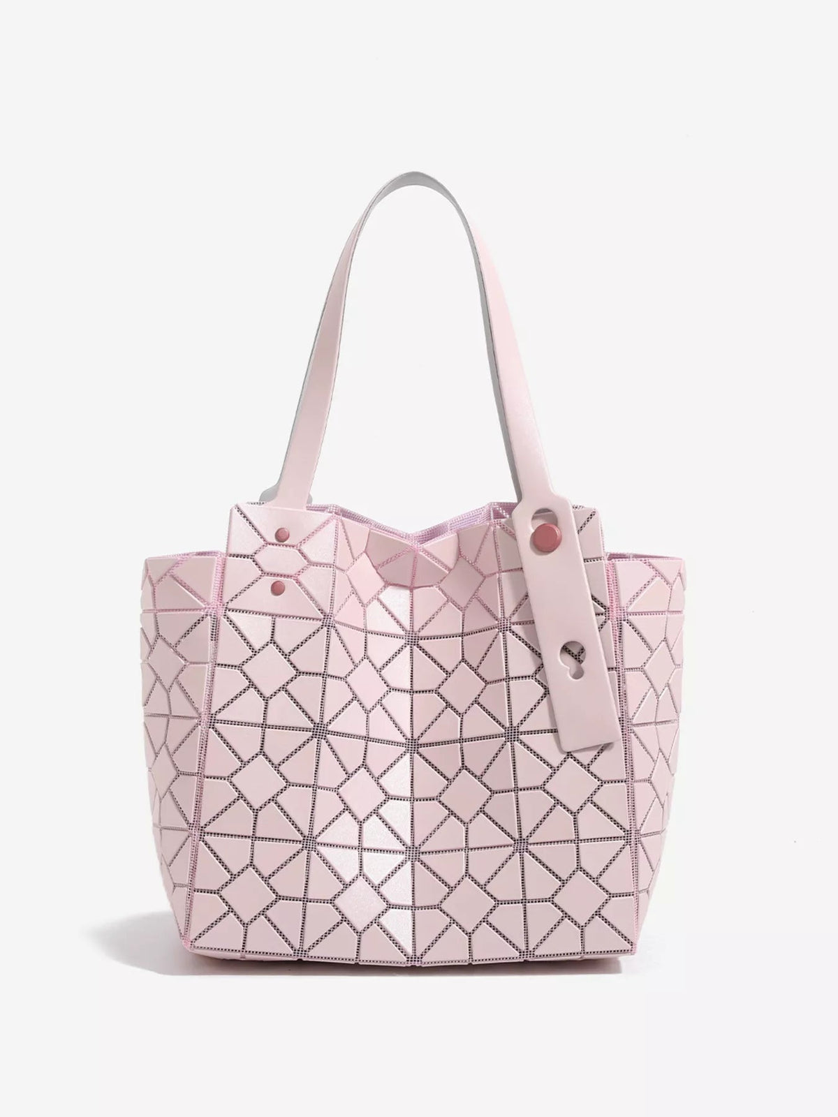 Medium pale pink PVC handbag with a structured silhouette, geometric lattice panel construction, twin top handles, and visible snap hardware.
