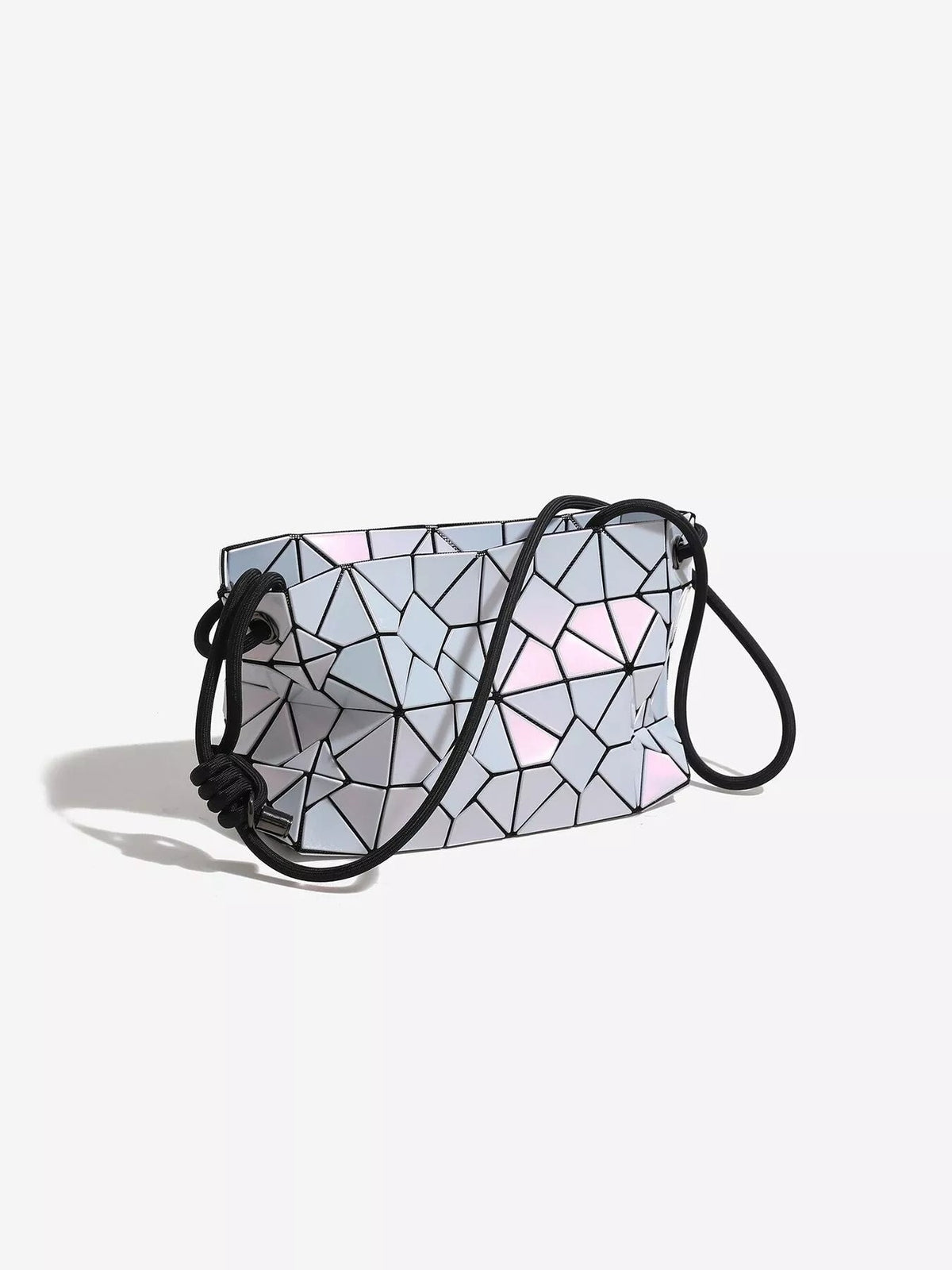 Small PVC shoulder bag with an iridescent geometric prism pattern, structured rectangular silhouette, black edging, and a long corded strap.
