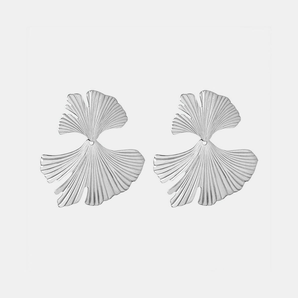 Paired Ginkgo Biloba Design Stud Earrings feature elongated fan-shaped leaves with fine radiating veins and a polished metallic finish.
