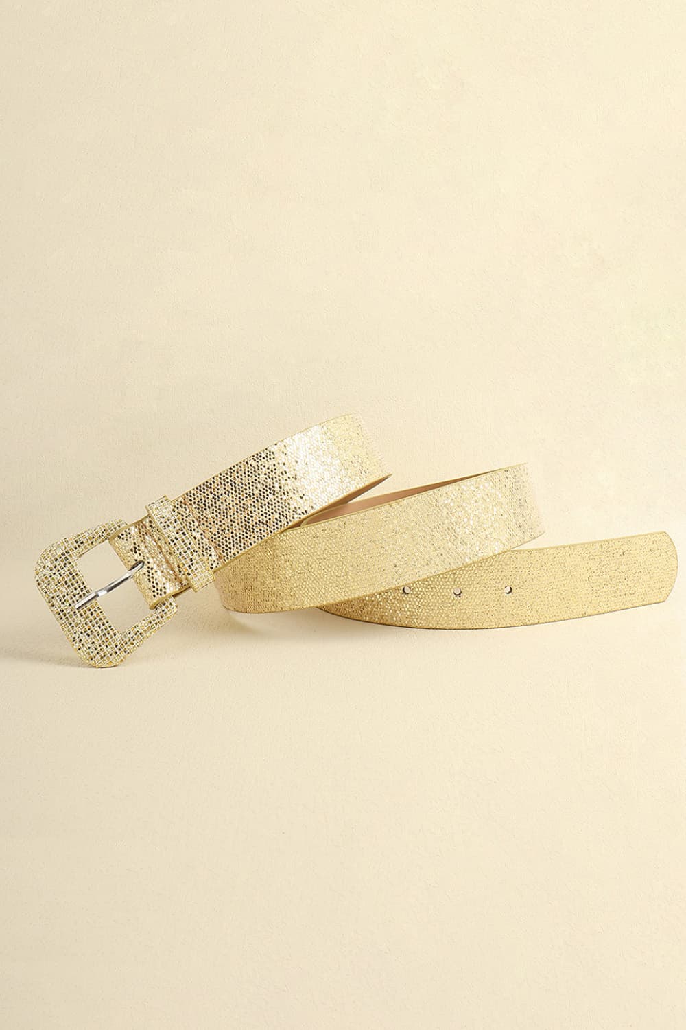 Gold glitter PU leather belt with a slim 1.5-inch profile, textured finish, adjustable holes, and a structured 2-inch rectangular buckle.