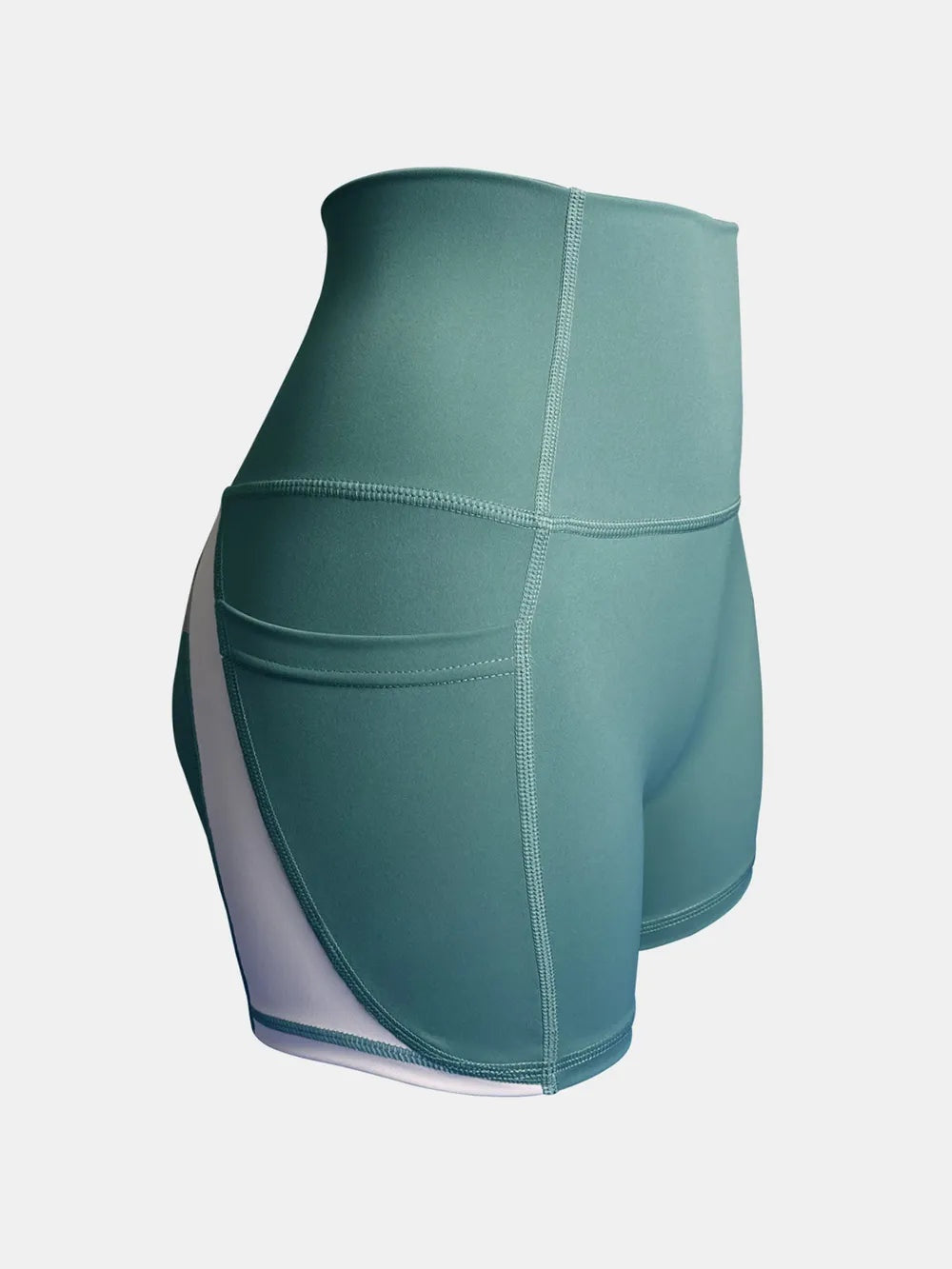 Teal high waist active shorts feature a fitted silhouette, moderate stretch, flat construction seams, and a contrasting side panel with a pocket detail.