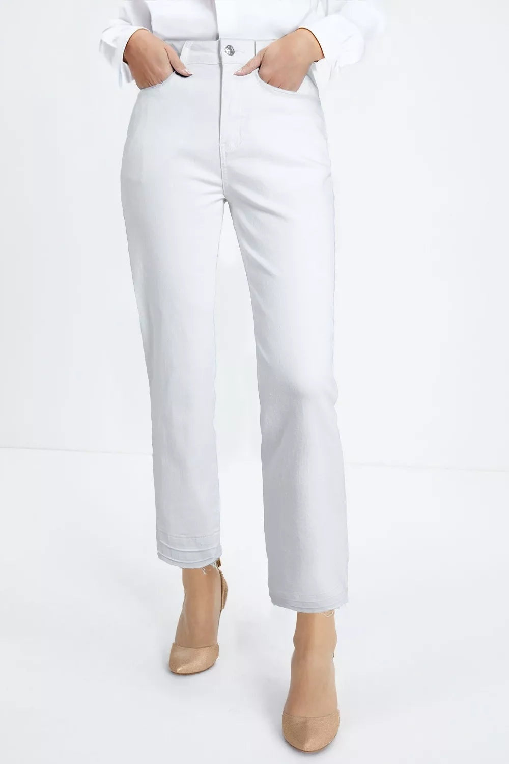 Model wearing white high-waisted straight-leg jeans with front pockets, a button fly, ankle-length hems, and a relaxed silhouette.