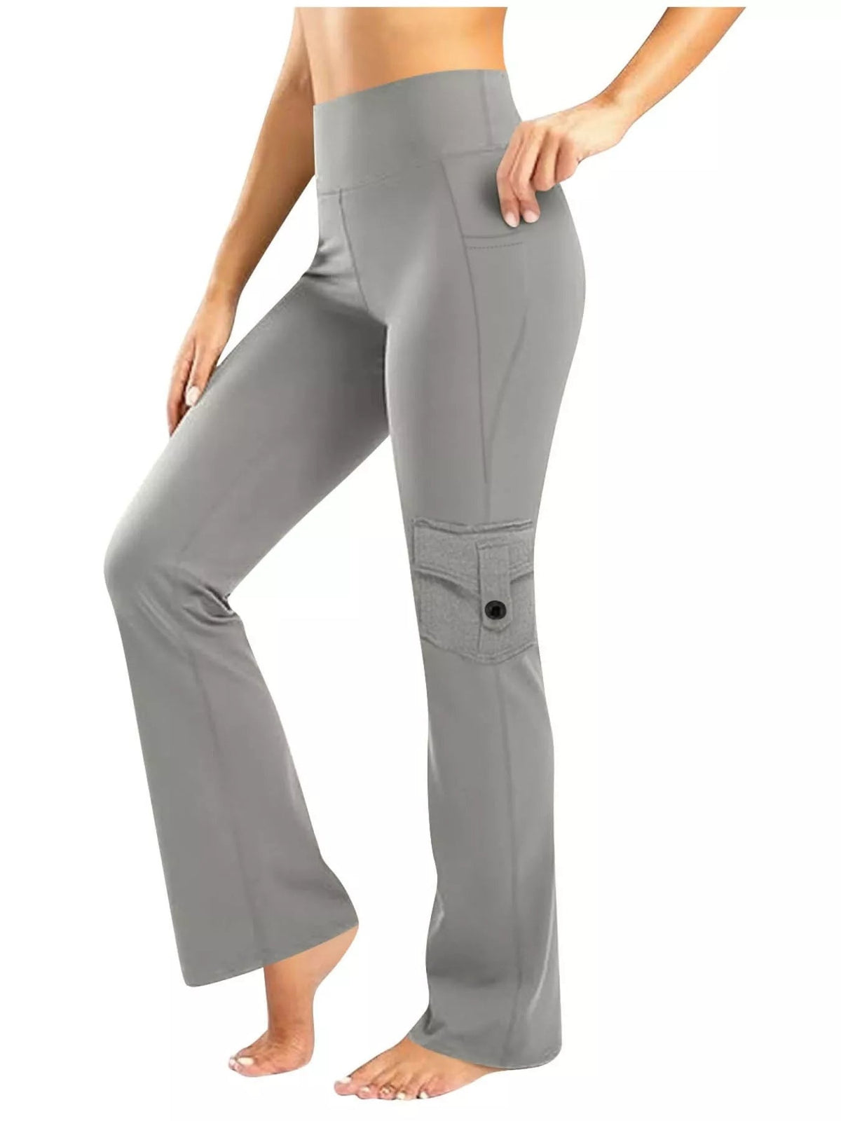 Model poses in gray high-waisted yoga pants with a flared silhouette, side pockets, and a buttoned utility pocket detail on the thigh.