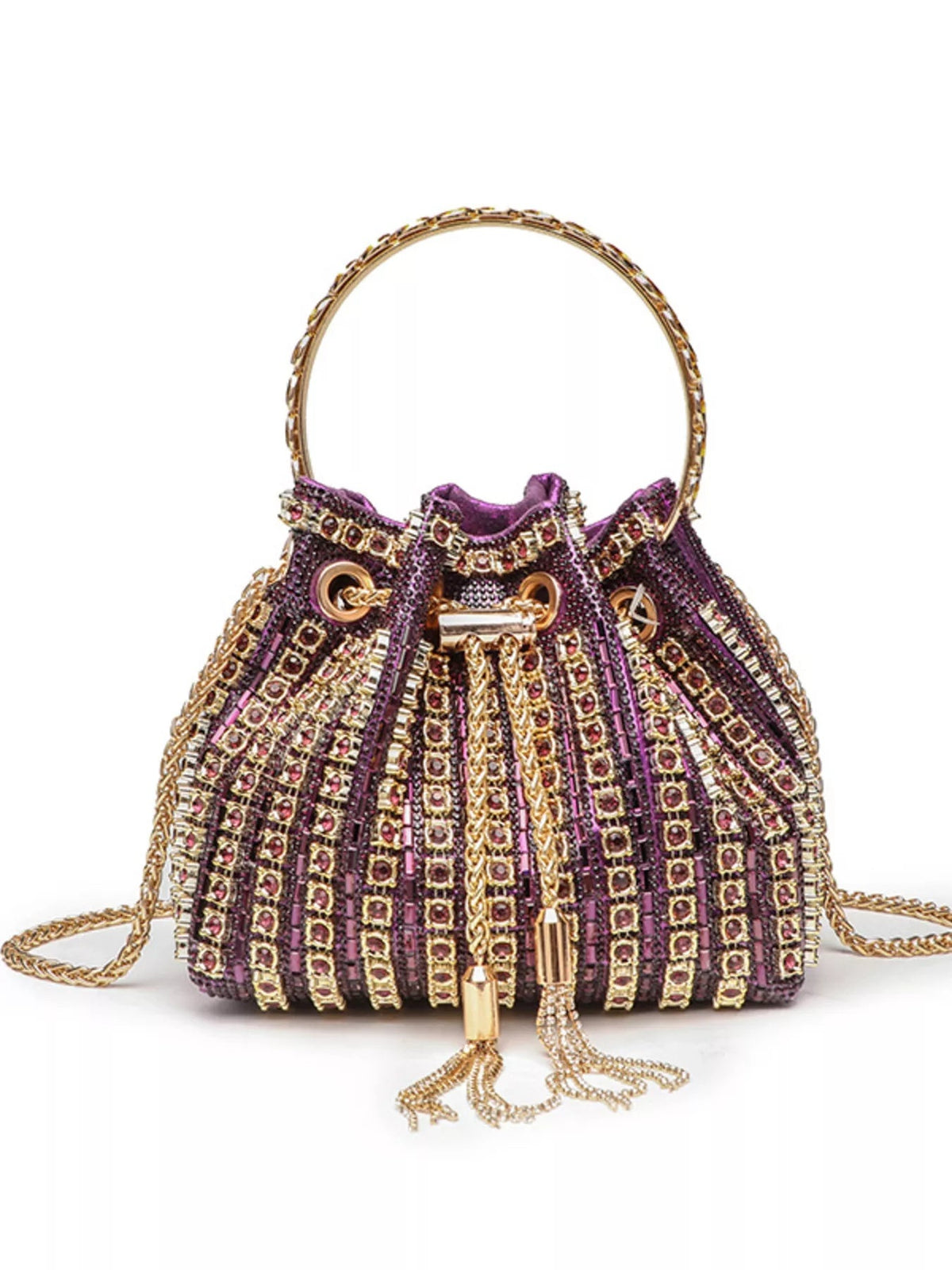 A mini purple PVC bucket handbag with dense rhinestone embellishment, a gold-tone top handle, chain crossbody strap, and dangling tassel accents.