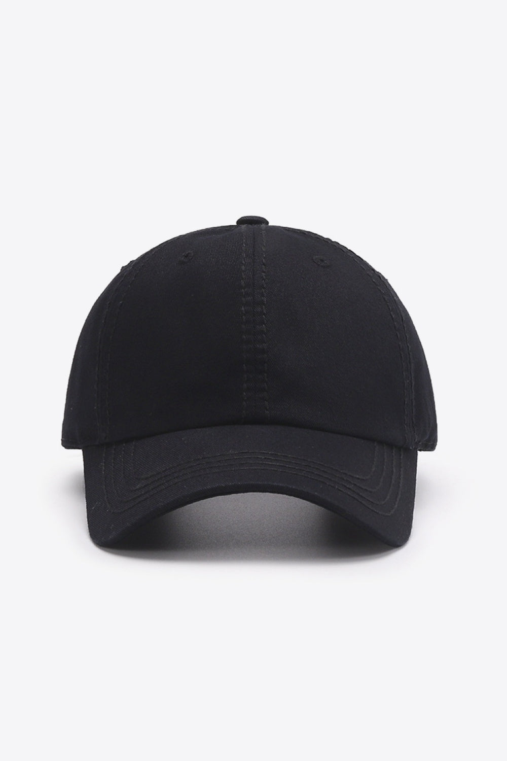 The black In A Pretty World baseball cap features a softly structured crown, curved brim, solid design, and neatly defined stitching.