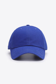 Solid blue cotton baseball cap with a softly structured crown, curved brim, top button, and neatly defined tonal stitching.