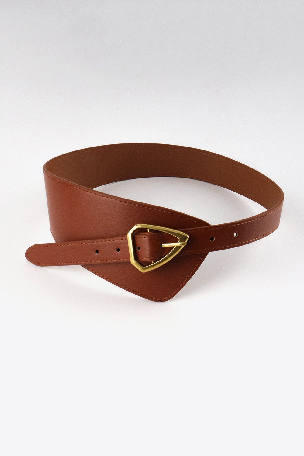 Brown irregular PU leather belt with a sculptural wide waist panel, narrower strap, pointed tail, gold buckle, adjustment holes, and stitched edges.
