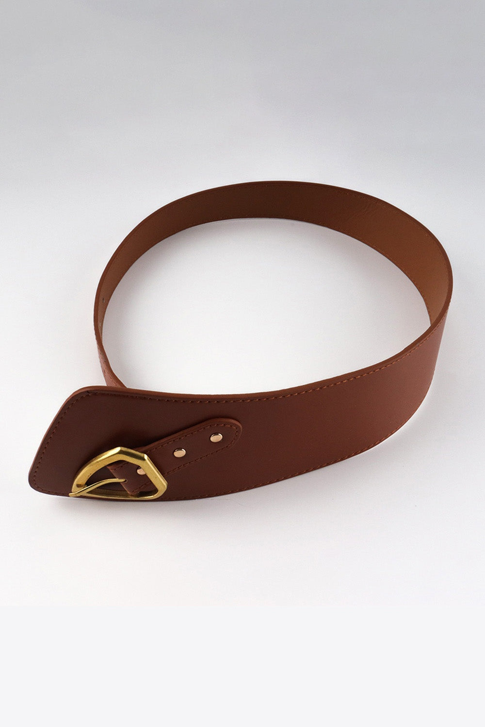 Brown irregular PU leather belt with a sculptural wide waist panel, narrower strap, stitched edges, visible adjustment holes, and a gold-tone buckle.