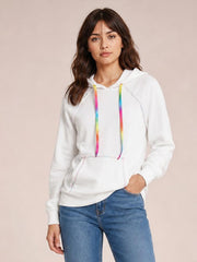 Model wearing a white raglan sleeve hoodie with contrast stitching, a drawstring hood with colorful cords, front pouch pocket, and relaxed silhouette.