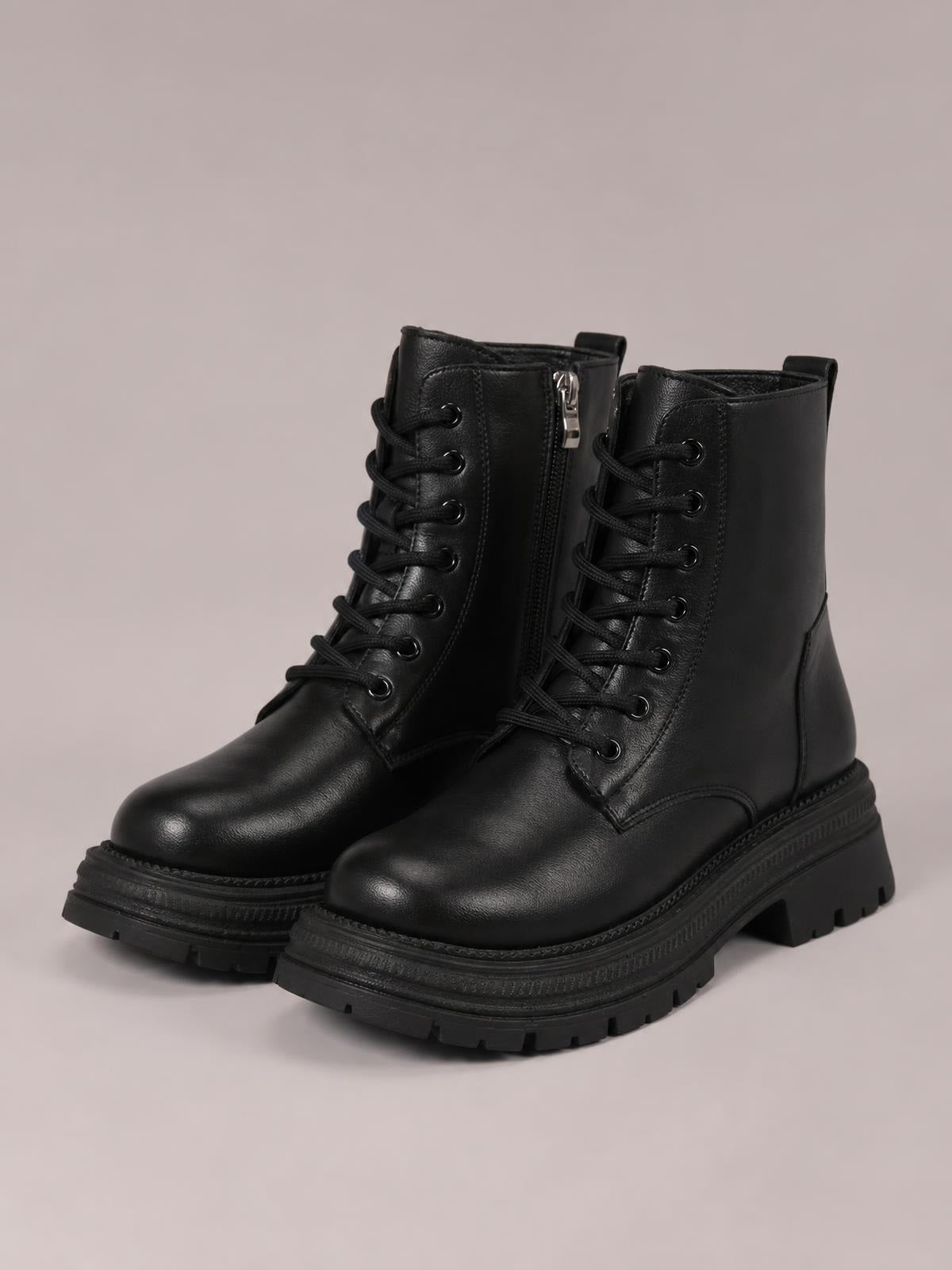Black PU leather lace-up platform boots with side zips, round toes, tall shafts, low heels, and rugged rubber lug soles.