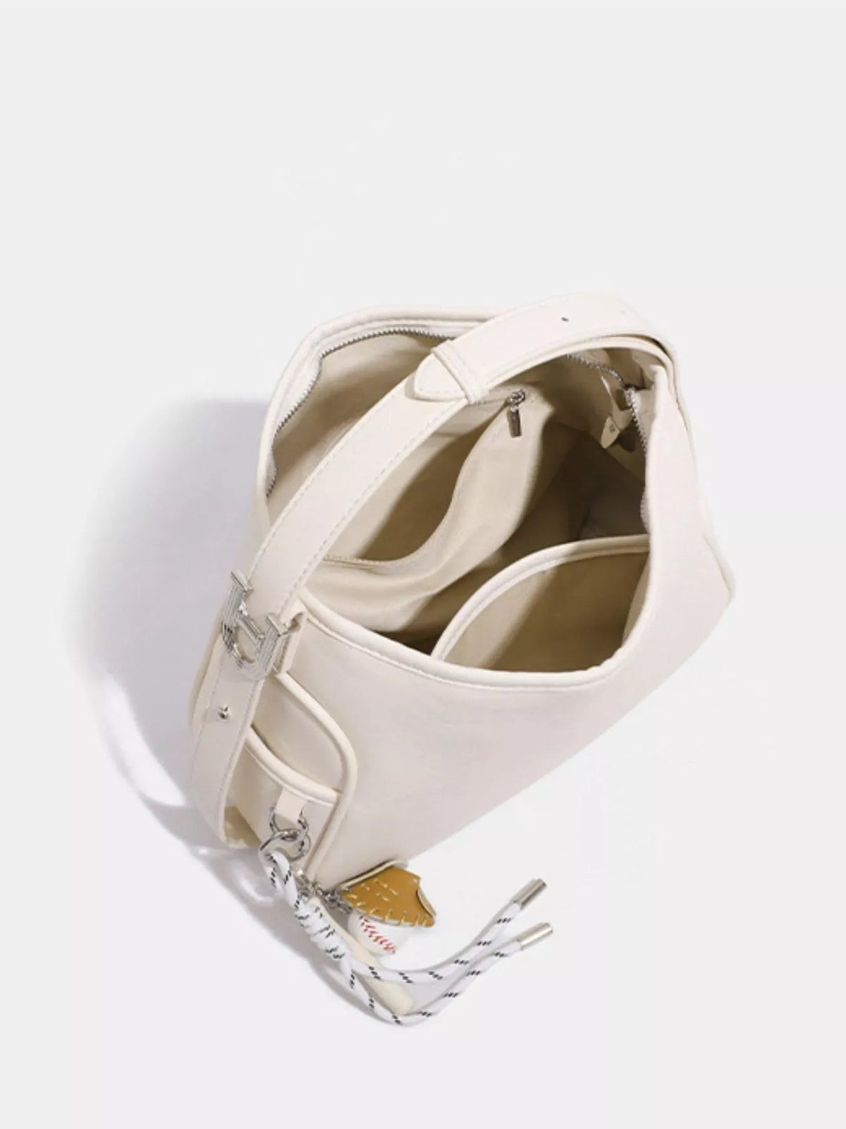 Cream medium PU leather slouchy shoulder bag shown open, featuring a spacious interior, zip-top closure, wide strap, and silver-tone hardware.
