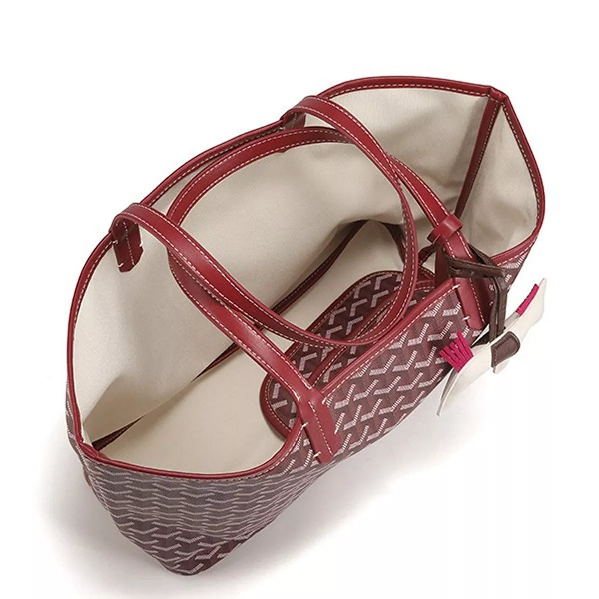 Large burgundy PU leather tote handbag with a geometric pattern, open structured silhouette, double handles, detachable pouch, and horse charm.