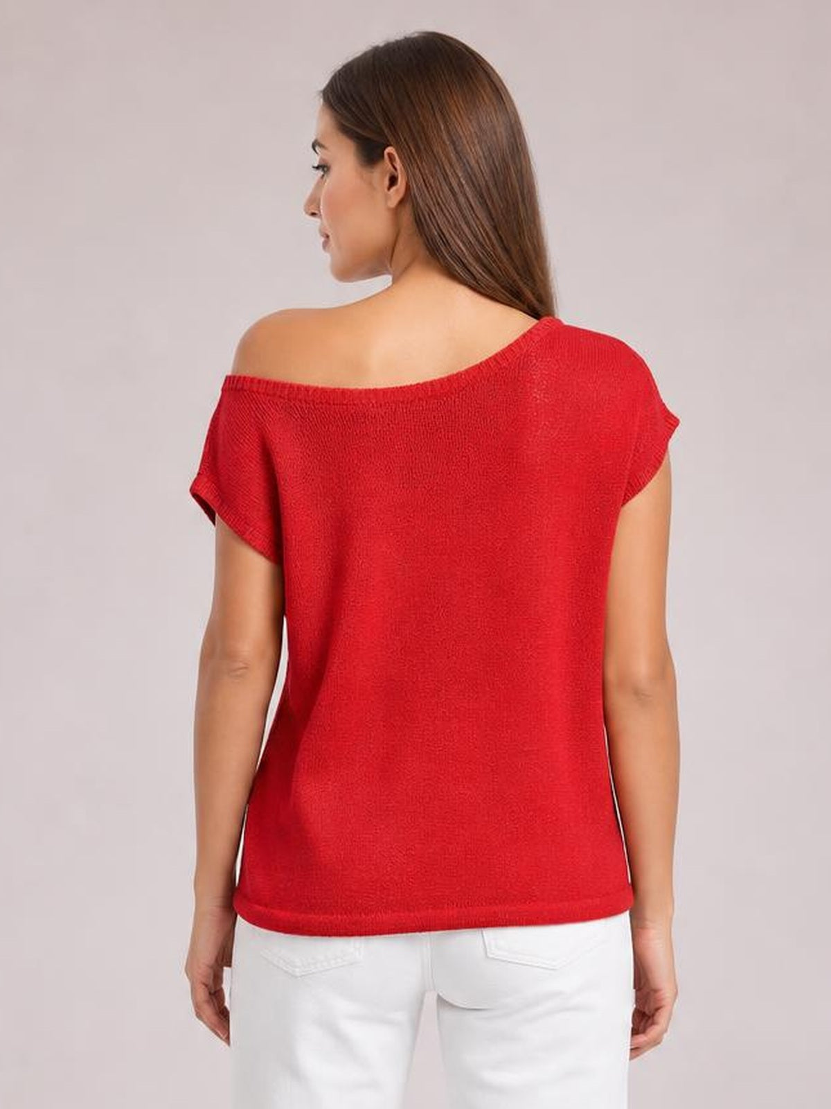Model shown from behind wearing a red boat neck short sleeve knit top with a relaxed straight silhouette, wide neckline, and rolled sleeve edges.