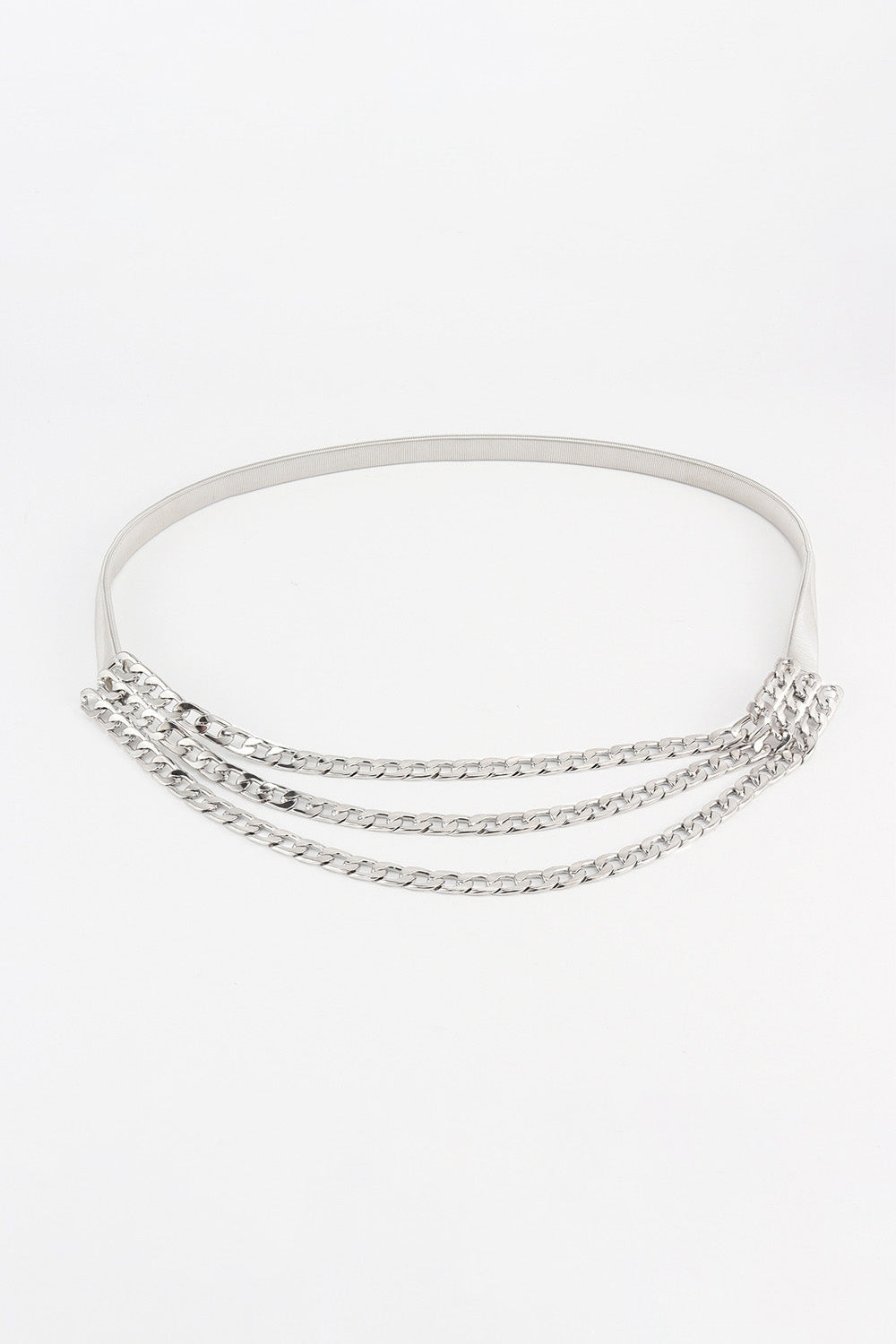 Silver-toned metal triple-layered chain belt with a slim upper band and three cascading linked chains forming a graceful draped waist silhouette.