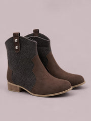 Brown mid-calf western boots feature dark contrast side panels, pull tabs, rounded toes, stitched construction, and sturdy low block heels.
