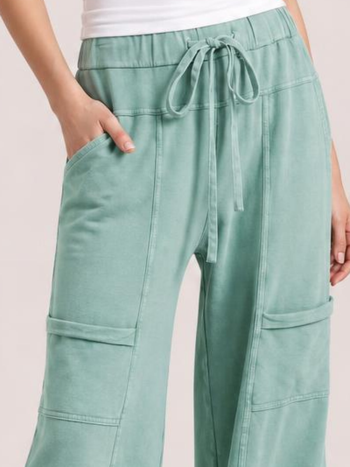 Mineral Wash Exposed Seam Drawstring High Waist Wide Leg Cargo Pants · Studio Prop Pose